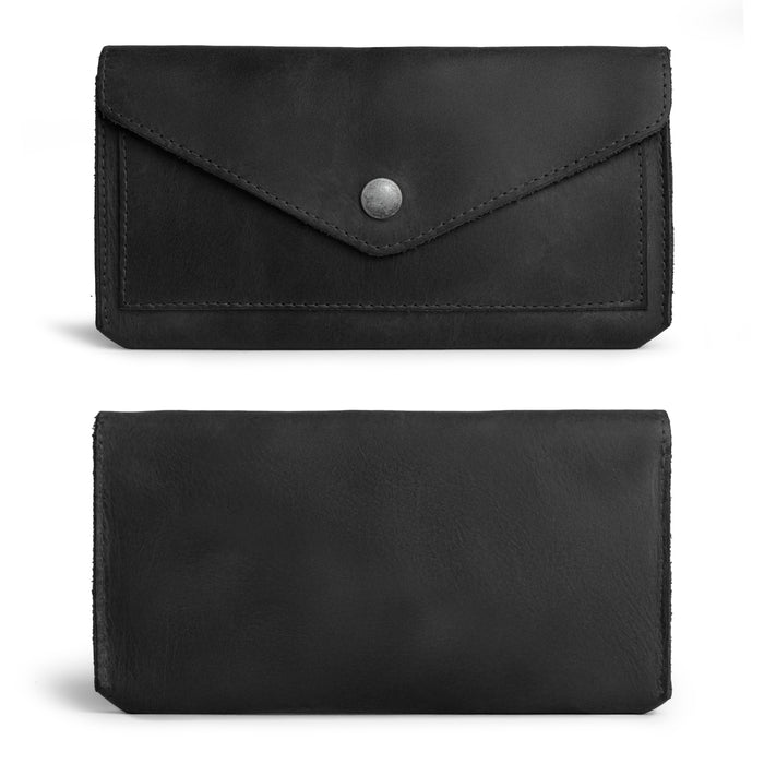 Inside view of the Large Female Wallet from Hide & Drink, showing cash and cards stored securely. This handmade Vintage Money and Card Holder is crafted from Full Grain Leather and serves as a functional Travel Organizer for Women.