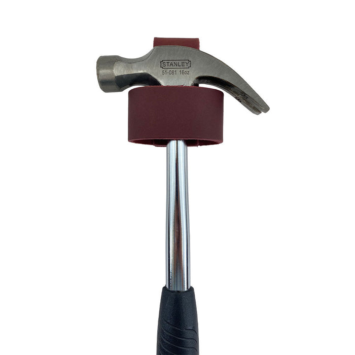 Large Hammer Holster by Hide & Drink, presenting its practical use and elegant design. This hammer holder with a belt loop is perfect for keeping tools organized while on the job. Artisan-crafted in La Antigua Guatemala for superior craftsmanship.
