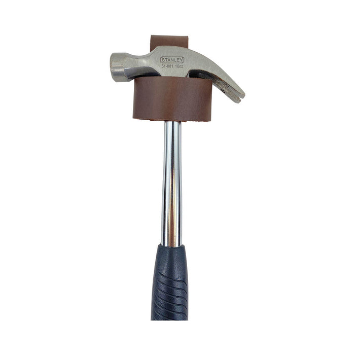 Large Hammer Holster by Hide & Drink, demonstrating its function as a waist axe holster while holding a hammer securely in place. Constructed with high-quality full grain leather, this rustic tool organizer is perfect for artisans. Handmade in Oaxaca Mexico for superior durability.