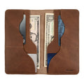 Hide & Drink Large Organizer Wallet in use with cash and cards. This handmade bifold wallet is made from premium full grain leather and is an excellent night bag and travel accessory, showcasing artisan quality from La Antigua Guatemala & Oaxaca Mexico.