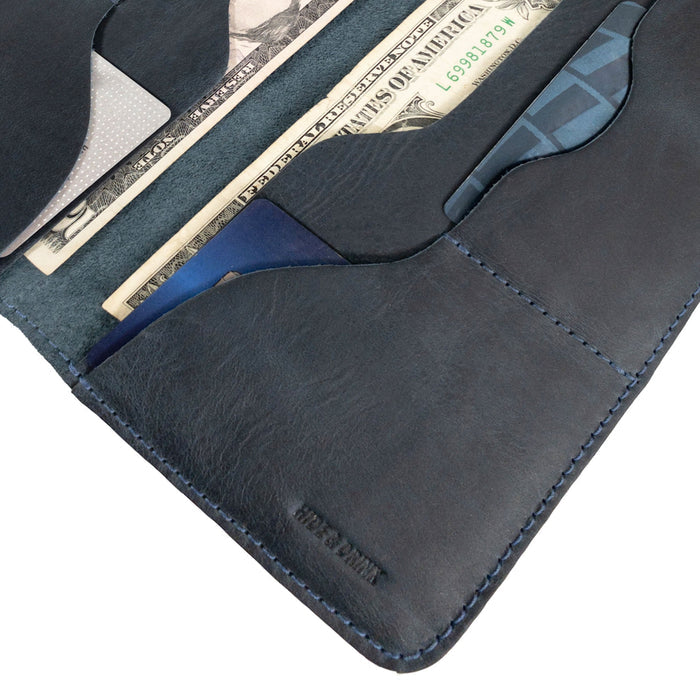 Hide & Drink Large Organizer Wallet displayed open to show card slots and cash holders. This artisan-crafted bifold wallet is made from quality full grain leather, serving as a stylish night bag and travel accessory, handmade in La Antigua Guatemala & Oaxaca Mexico.