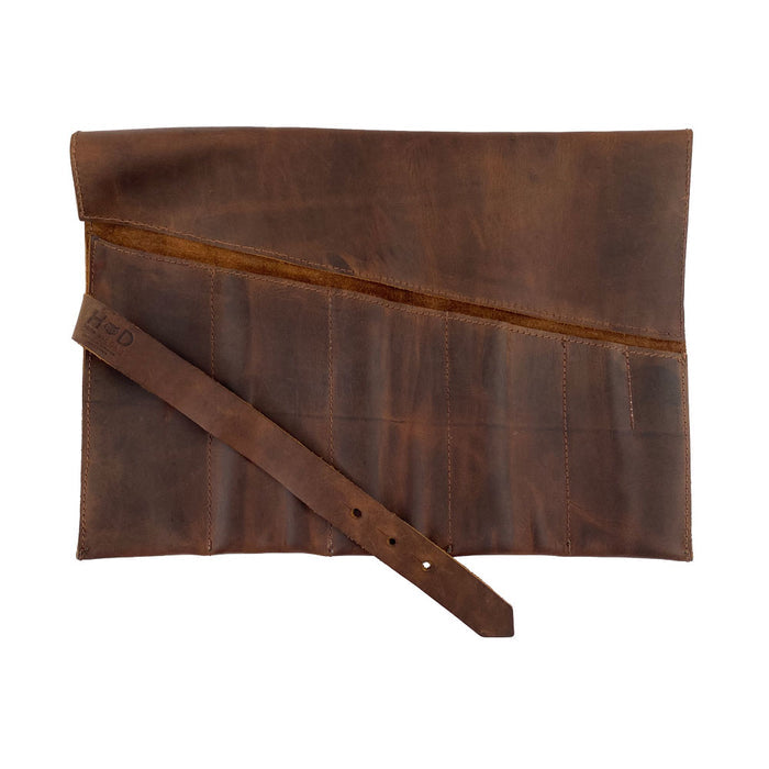 Hide & Drink's Large Tool Roll, designed for convenience with a stylish appearance. This Portable Carry-On Pouch incorporates 6 slots for effective woodworking tools management. Made from waxed canvas and full grain leather variations, this artisan product is hand cut and sewn, representing small batch production handmade in La Antigua Guatemala & Oaxaca Mexico.