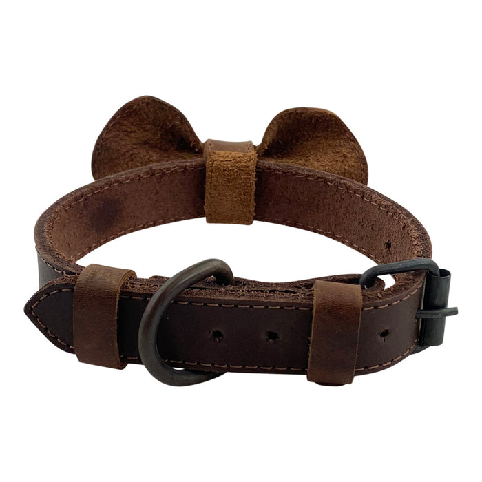 Back view of the Leather Bow Tie Collar by Taco Dog, highlighting its rustic style and secure fit for small dogs. This handmade pet accessory is crafted from full grain leather, perfect for adventurous puppies. Celebrate small batch production with this artisanal collar, combining hand cut and hand sewn details for a chic pet look.