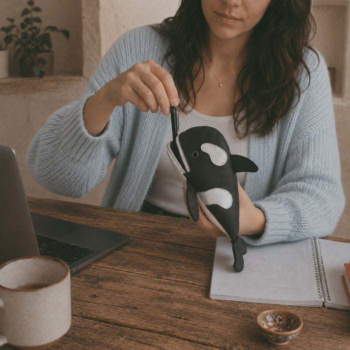 Showcasing a fun orca design, the Orca Pencil Pouch by Hide & Play combines functionality and style with its full grain leather construction. This artisan-crafted pencil pouch doubles as a unique pen case and desk organizer, handmade in La Antigua Guatemala & Oaxaca Mexico.