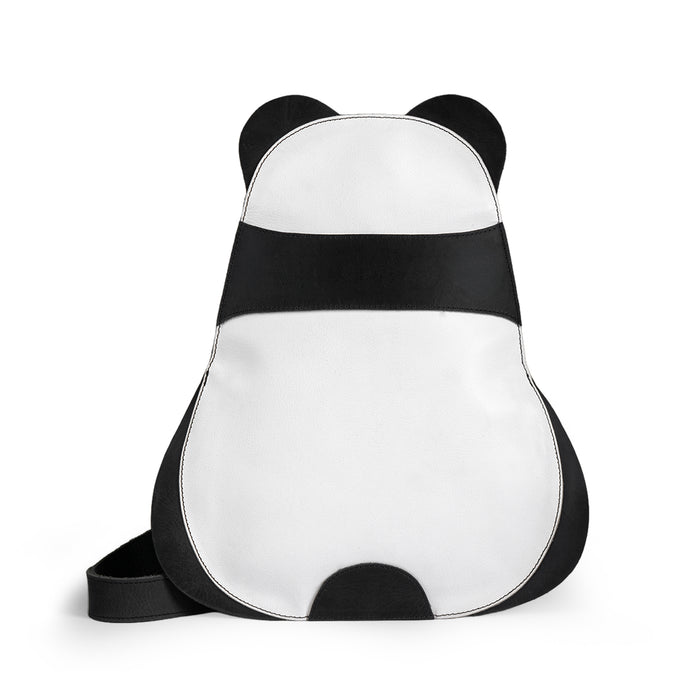A stylish Panda-Shaped Crossbody Bag by Hide & Play, showcasing an adorable panda design made from full grain leather. Perfect for animal lovers and trendsetters, it embodies quality with small batch production, handmade in La Antigua Guatemala & Oaxaca Mexico.
