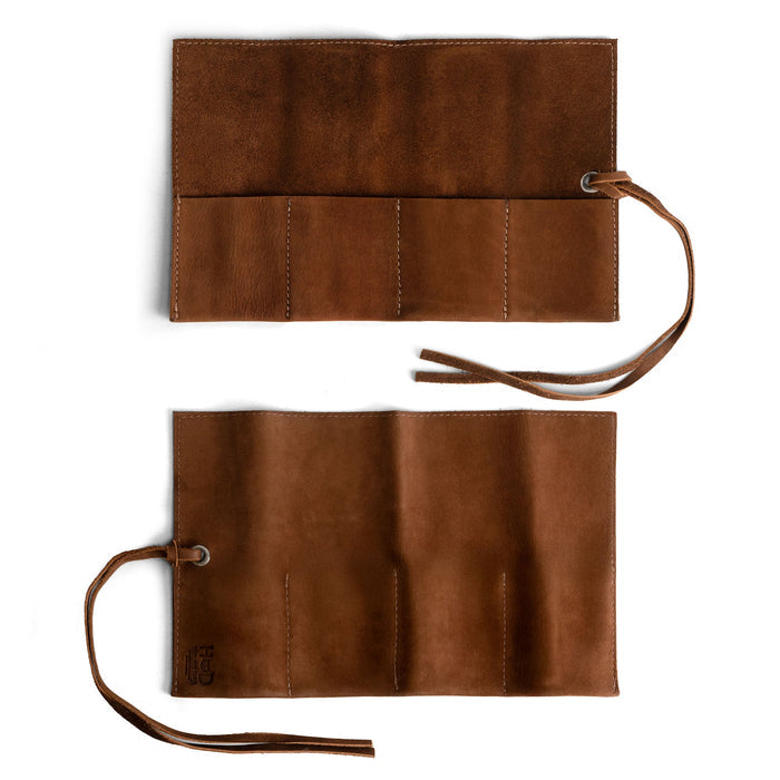 Quality Watch Roll by Hide & Drink, effortlessly holds up to 4 watches. This easy carry Watch Roll Organizer is crafted with full grain leather, featuring small batch production, hand cut, hand sewn, and fire branded artisan design made in La Antigua Guatemala & Oaxaca Mexico.