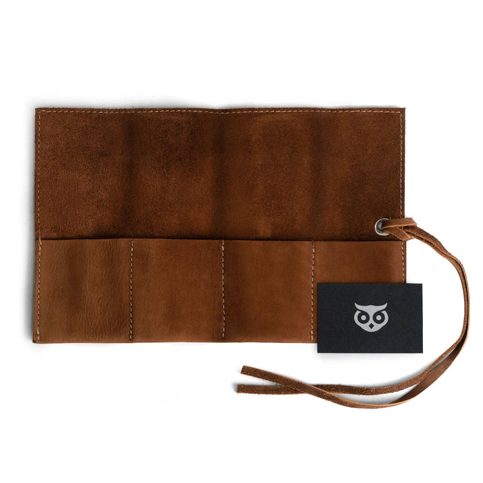 Versatile Watch Roll by Hide & Drink, designed to hold up to 4 watches. This easy carry Watch Roll Organizer features full grain leather craftsmanship, highlighting small batch production, hand cut, hand sewn, and fire branded quality, made in La Antigua Guatemala & Oaxaca Mexico.
