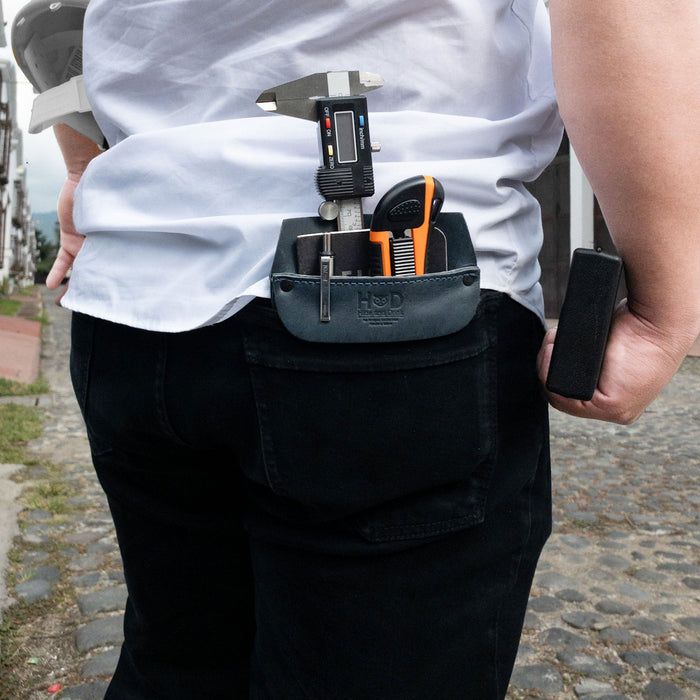 Hide & Drink Leather Work Pocket in a flat position, emphasizing its minimalist design. This Leather Work Pocket, made from Full Grain Leather, is ideal for organizing tools and pens on the go.
