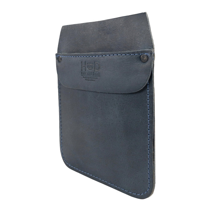 Hide & Drink Leather Work Pocket presented with accessories, encapsulating its artisan spirit. Crafted from Full Grain Leather, this Work Pocket is perfect for anyone seeking quality craftsmanship.