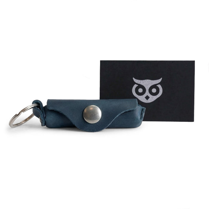 Showcasing a full view of the Hide & Drink Lip Balm Key Chain with its stylish packaging, reinforcing its status as a classic vintage lip balm keychain holder made from premium full grain leather.