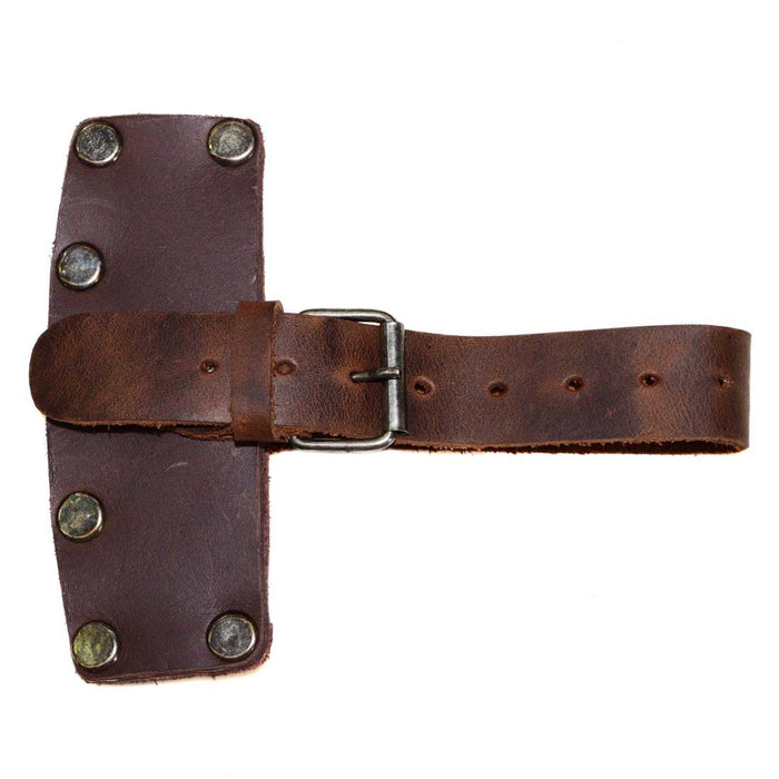 A close-up of the Hide & Drink Lumberjack Axe Sheath highlighting its rustic design and adjustable strap, perfect for securing your hatchet. Made from full grain leather, this protector holster represents quality small batch production techniques, hand cut and sewn by artisans.