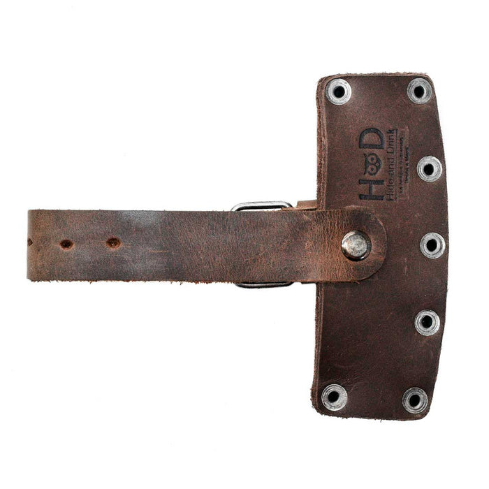 Lumberjack Axe Sheath by Hide & Drink, featuring a unique rustic leather design with an adjustable strap. This durable protector holster highlights the small batch production and hand sewn quality of full grain leather, showcasing artisan craftsmanship from Guatemala.