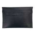Sleek design of the Hide & Drink MacBook Slim Case in black, showcasing its fine full grain leather texture. Perfect for MacBook Air/Pro 13 Inch with M1 Chip, this artisan case highlights hand cut, hand sewn quality and is lovingly crafted in La Antigua Guatemala.