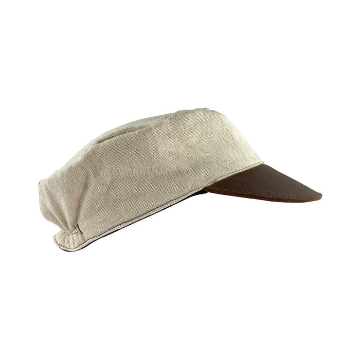 Side view of the Manta Cotton Painter Cap by Hide & Drink, showcasing its unique design made from Full Grain Leather & Natural Manta Cotton, perfect for artists. This Canvas Painter Cap features small batch production, is hand cut, hand sewn, and fire branded, representing artisan craftsmanship made in La Antigua Guatemala & Oaxaca Mexico.