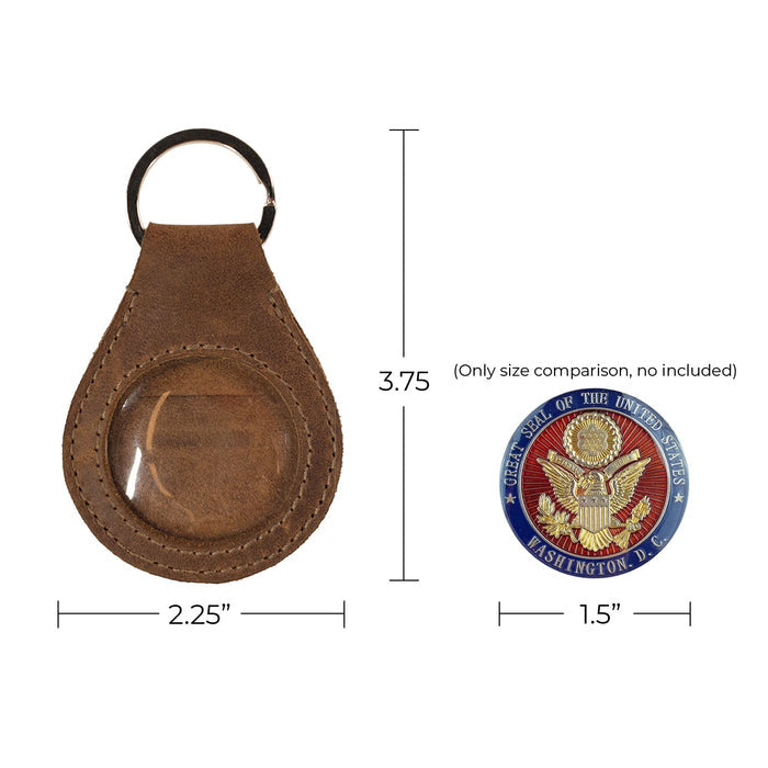 The Medallion Holder Keychain by Hide & Drink displayed with measurements, illustrating its practicality alongside a secured medallion and keyring attachment. This handmade item, crafted from full grain leather, showcases artisan craftsmanship from La Antigua Guatemala & Oaxaca Mexico.