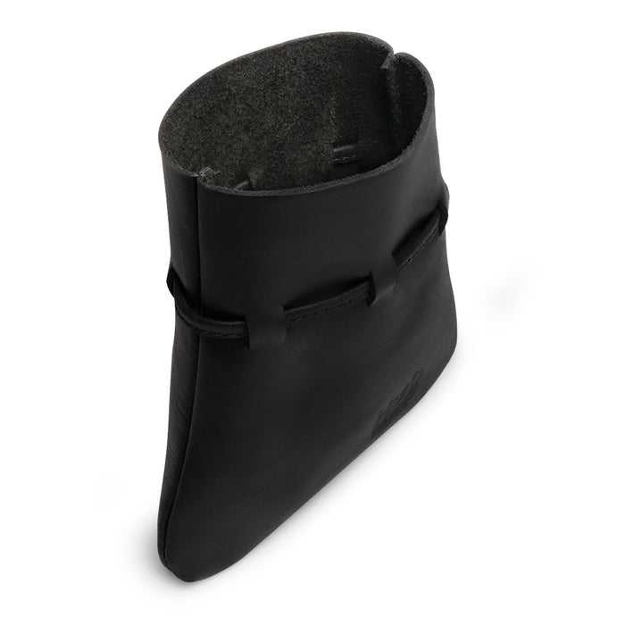 A detailed view of the top rim of the Medieval Coin Pouch by Hide & Drink, depicting its hand-sewn craftsmanship. This Medieval Drawstring Coin Pouch combines vintage style with practicality, made of Full Grain Leather and showcasing artisan, small batch production. Handmade in La Antigua Guatemala & Oaxaca Mexico.