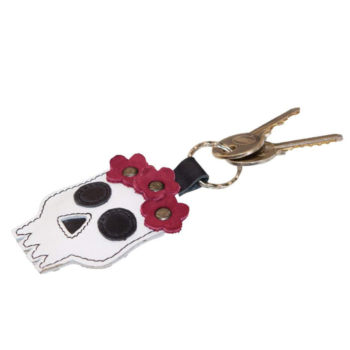 The Mexican Skull Keychain by Hide & Drink, displayed with keys, accentuating its practical and stylish design. Perfect for Day Of The Dead, this artisan accessory, crafted from durable Full Grain Leather, is a testament to small batch production and handmade excellence from La Antigua Guatemala & Oaxaca Mexico.