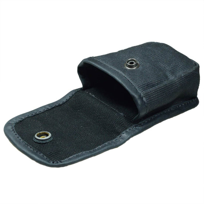 Hide & Drink's Mini Belt Pouch from a side view, illustrating its sleek tabletop design. This multipurpose hip bag is perfect for camping and fishing, crafted from water-resistant waxed canvas, showcasing stockyardX quality through hand-cut and hand-sewn artisan craftsmanship, made in La Antigua Guatemala & Oaxaca Mexico.