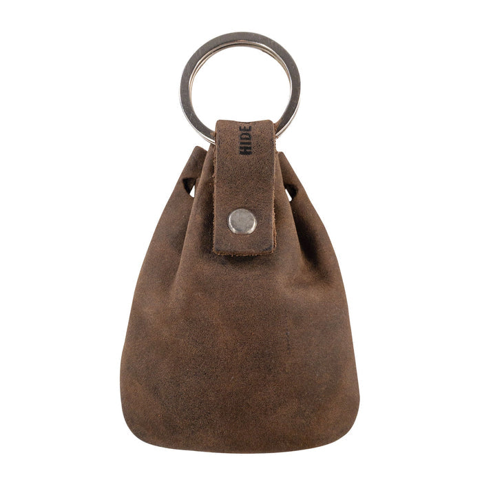 Front view of the Mini Medieval Pouch Keychain by Hide & Drink, showcasing its stylish keyring attachment. This tiny bag with keyring made from full grain leather serves as a coin organizer, emphasizing artisan quality through hand-cut and hand-sewn methods in La Antigua Guatemala.