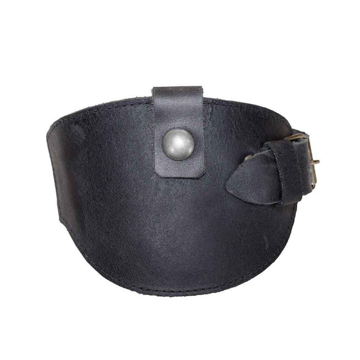 Front view of the black Motorcycle Boot Protector by Hide & Drink, featuring a buckle closure that ensures shoe safety from shifter damage. Handcrafted from high-quality full grain leather, this motorcycle accessory showcases artisan skill and is proudly made in La Antigua Guatemala.