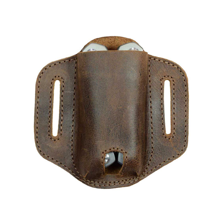 Front view of the Hide & Drink Multitool Belt Sheath holding tools securely. Made from high-quality full grain leather, this multitool holder serves as a reliable outdoor accessory, handcrafted with care in La Antigua Guatemala & Oaxaca Mexico.