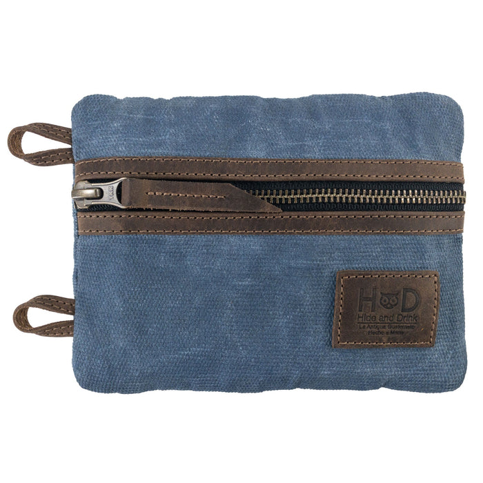 Back view of the blue Multi-tool Pocket Pouch - XL by Hide & Drink featuring unique sleeve pockets for organization while highlighting craftsmanship. Multi-Tool Pocket Pouch XL, Compact Multipurpose EDC Zippered Bag, Mini Camping Tool Case, Knife Holster, Handmade Slim Organizer, Waxed Canvas, StockyardX, Small Batch Production, Artisan, Handmade in La Antigua Guatemala & Oaxaca Mexico.
