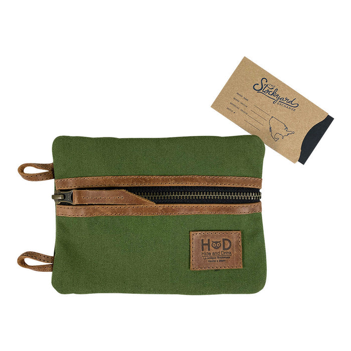 Front view of the blue Multi-tool Pocket Pouch - XL by Hide & Drink, showcasing its sleek design and utility for carrying tools or small items. Multi-Tool Pocket Pouch XL, Compact Multipurpose EDC Zippered Bag, Mini Camping Tool Case, Knife Holster, Handmade Slim Organizer, Waxed Canvas, StockyardX, Small Batch Production, Artisan, Handmade in La Antigua Guatemala & Oaxaca Mexico.