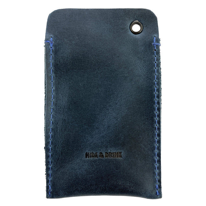 Hide & Drink's Multitool Pocket Sleeve EDC in blue leather, designed for carrying essential tools and pens. This EDC Pocket Slip is a testament to artisan craftsmanship, small batch production, and meticulous attention to detail from La Antigua Guatemala.