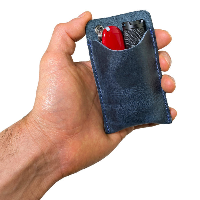 The dimensions and design of Hide & Drink's Multitool Pocket Sleeve EDC, showcasing its practicality as a small tool organizer. Crafted with artisan techniques from full grain leather, this EDC Pocket Slip represents quality and small batch production.