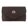 Stylish Nail Clipper Roll Case by The Stockyard Exchange, crafted from high-quality Full Grain Leather. This rustic roll serves as a Nail Clipper Set Case, perfect for organizing toiletries while traveling. Handmade in La Antigua Guatemala, each piece is meticulously hand cut, fire branded, and sewn by artisans, ensuring durability in this small batch production.