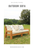 DIY outdoor sofa building plans cover – finished cedar sofa with cushions and throw pillows on a grass lawn