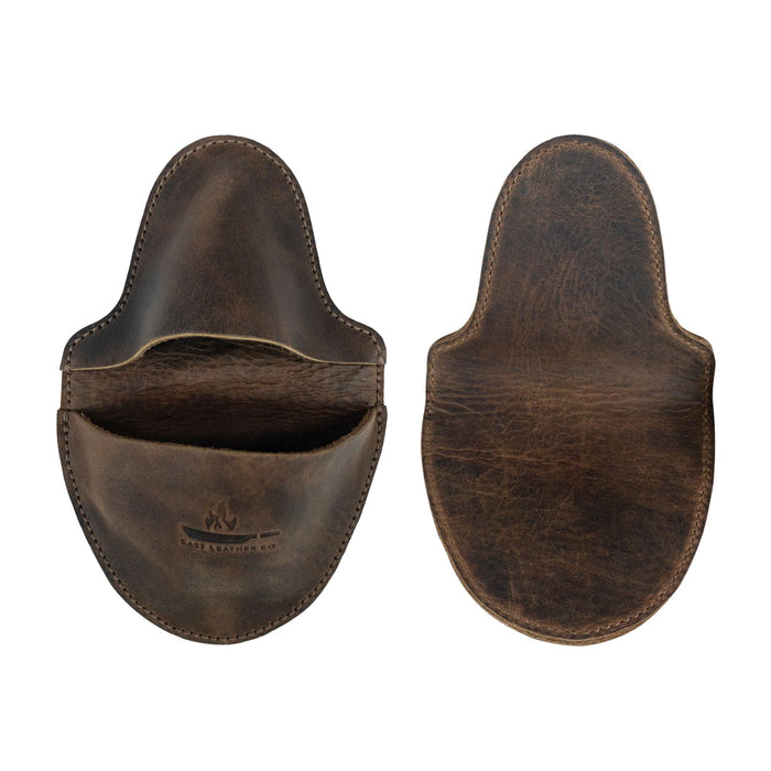 Front and back view of the Oven Mitt Heat Resistant from Cast Leather Co., highlighting its robust design and leather craftsmanship. This unique oven glove, made from full grain leather, is perfect for kitchen cooking and baking, reflecting the artisan quality of small batch production in La Antigua Guatemala.