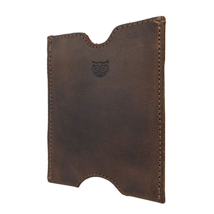 Side view of the Hide & Drink Passport Sleeve, showcasing its elegant design and quality construction. This handmade Travel Passport Pocket Sleeve is made from Full Grain Leather and features artisan craftsmanship like fire branding.