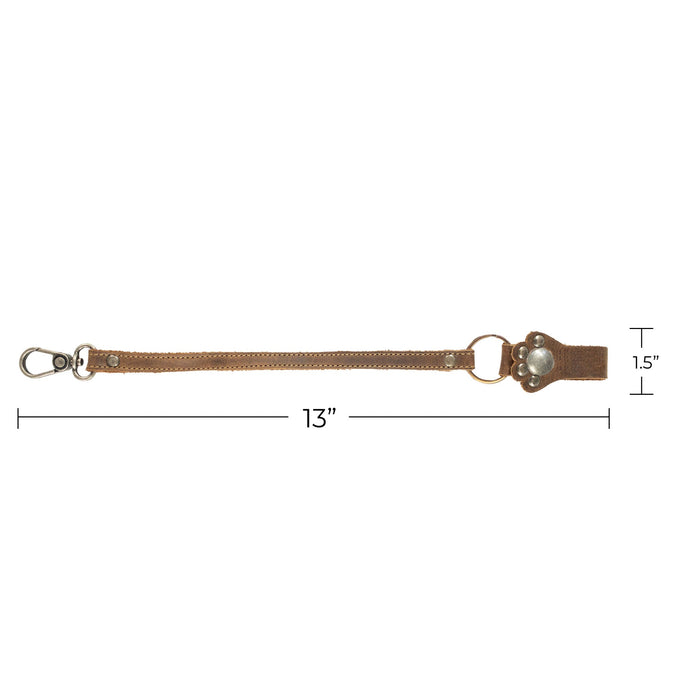 Elegant Paw Lanyard from Hide & Drink highlighting its detailed craftsmanship and dimensions. This Full Grain Leather key holder organizer is a perfect gift and embodies small batch production with artisan techniques, handmade in La Antigua Guatemala & Oaxaca Mexico.