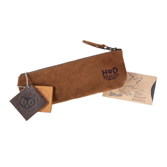 Hide & Drink's Pencil Pouch in a top view showcasing its durable design in full grain leather. This rectangular pencil case works as a stylish pen & marker pouch for men and women, featuring a flat zippered holder. Handmade in La Antigua Guatemala & Oaxaca Mexico, embracing artisan craftsmanship and small batch production.