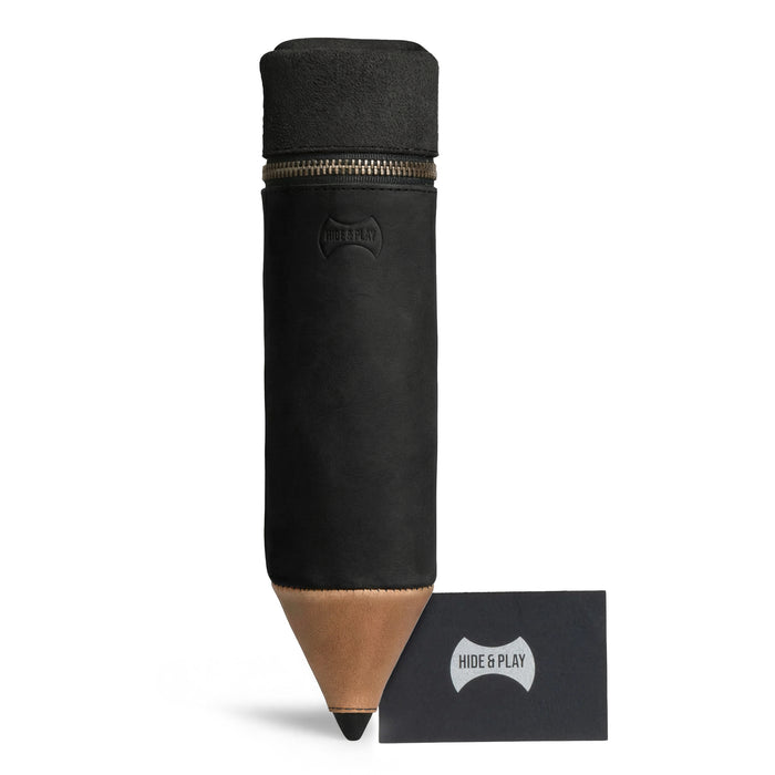 Pencil-Shaped Case by Hide & Play displayed with its brand tag. This handmade zippered bag, made from full grain leather, is perfect for organizing pens, pencils, markers, and office accessories, showcasing the artisan craftsmanship from La Antigua Guatemala.