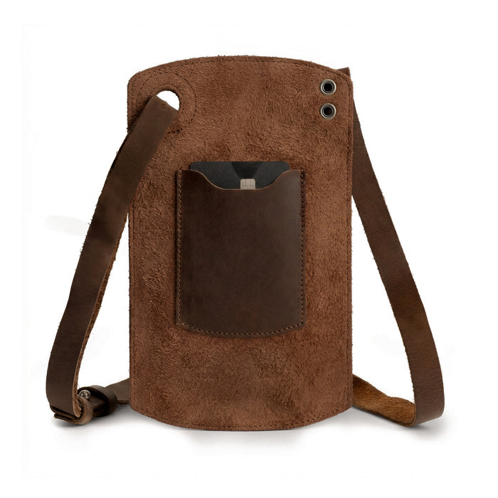 Back view of the Phone Purse with Adjustable Strap by Heather's, showcasing the soft texture and card slot feature. Ideal for everyday use, this horizontal cellphone bag is crafted from premium full grain leather and includes an adjustable neck strap. Each piece is handmade in La Antigua Guatemala, reflecting the artisan spirit of small batch production.