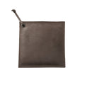 Hide & Drink Pot Pad, luxurious olive green leather highlighting craftsmanship. Perfect as a pot pad, this durable handmade piece is designed for kitchen use.