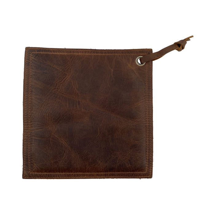 Back view of the Hide & Drink Pot Pad in dark brown leather. This handcrafted hot pot pad features a double-layered construction for longevity and style.