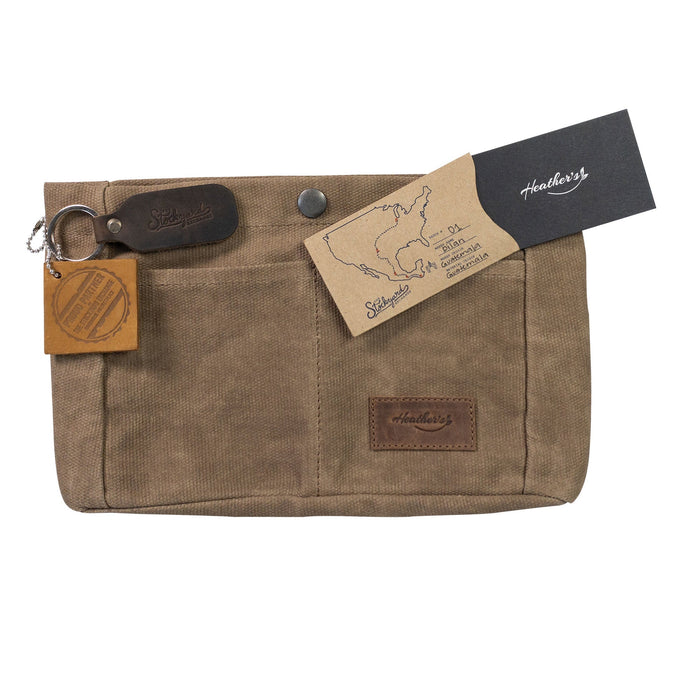 Heather's Purse Organizer Insert measuring 8.5 x 6 x 3 inches made from Waxed Canvas. Ideal for handbags and tote bags, it emphasizes the brand's commitment to artisan quality and offers handy cellphone storage, handmade in La Antigua Guatemala & Oaxaca Mexico.
