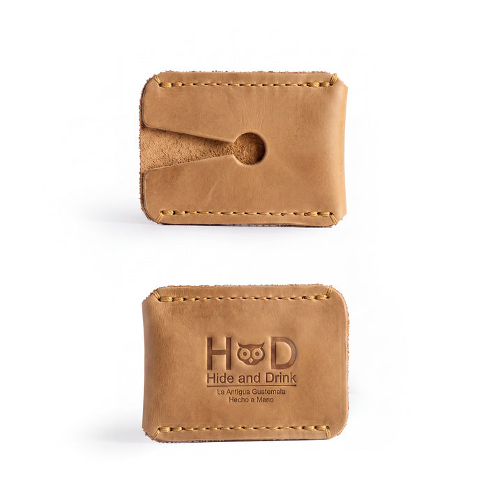 Handmade Razor Head Cover by Hide & Drink featuring a full grain leather protective sheath designed for double edge safety razors. This small batch production item is hand cut, hand sewn, and fire branded, making it a perfect shaving travel cover from artisans in La Antigua Guatemala and Oaxaca Mexico.