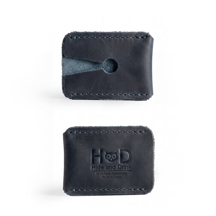 Top view of a Razor Head Cover by Hide & Drink crafted from full grain leather, designed for double edge safety razors, featuring fine stitching and a hole for easy handling. This shaving travel cover is perfect for protecting your razor head while embodying small batch production and artisan craftsmanship from La Antigua Guatemala.