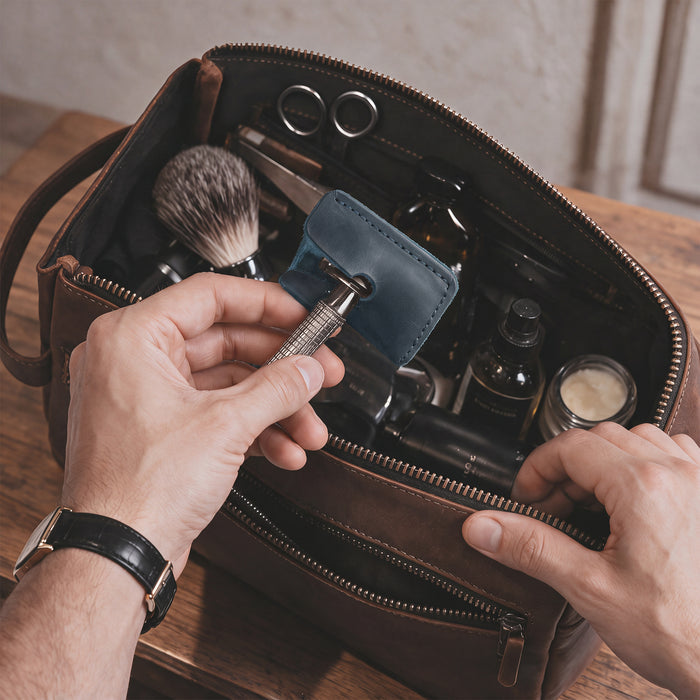 Side view of a Razor Head Cover by Hide & Drink fitted over a double edge safety razor, showcasing the protective sheath design in full grain leather. Ideal for safe traveling, this cover reflects handmade quality and small batch production from La Antigua Guatemala and Oaxaca Mexico.