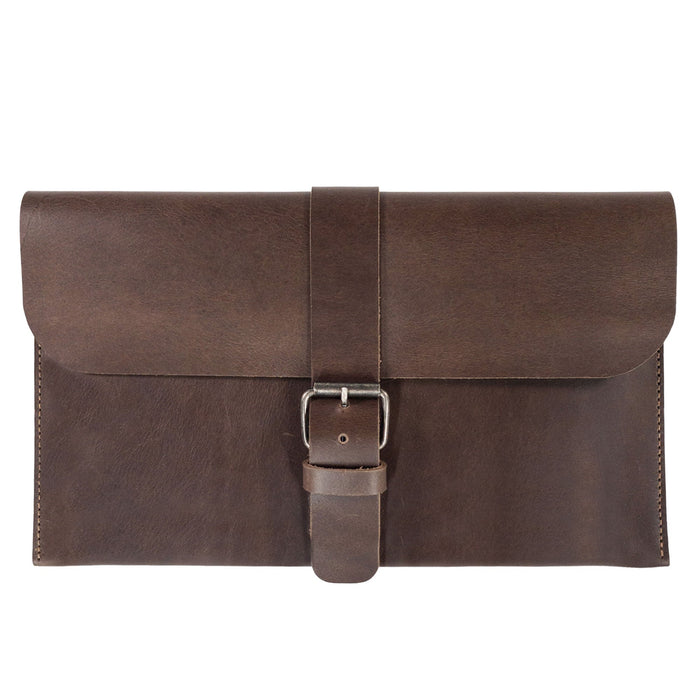 La Antigua's Rectangular Case for Notebook, a protective cover for an 8.25 x 5 in. notebook, showcasing a classic sleeve design. This travel accessory is made from high-quality full grain leather, featuring handmade craftsmanship with small batch production techniques. Perfect for writers and artists, this artisan sleeve is hand cut and hand sewn, fire branded, and inspired by the traditions of La Antigua Guatemala and Oaxaca Mexico.