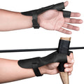 A pair of hands wearing the black variant of the Reinforced Archery Shooting Glove, showing its versatility and grip while handling a recurve bow. This Full Grain Leather glove ensures Wrist and Finger Protection, perfect for Shooting Targeting and Cosplay, handmade in La Antigua Guatemala.