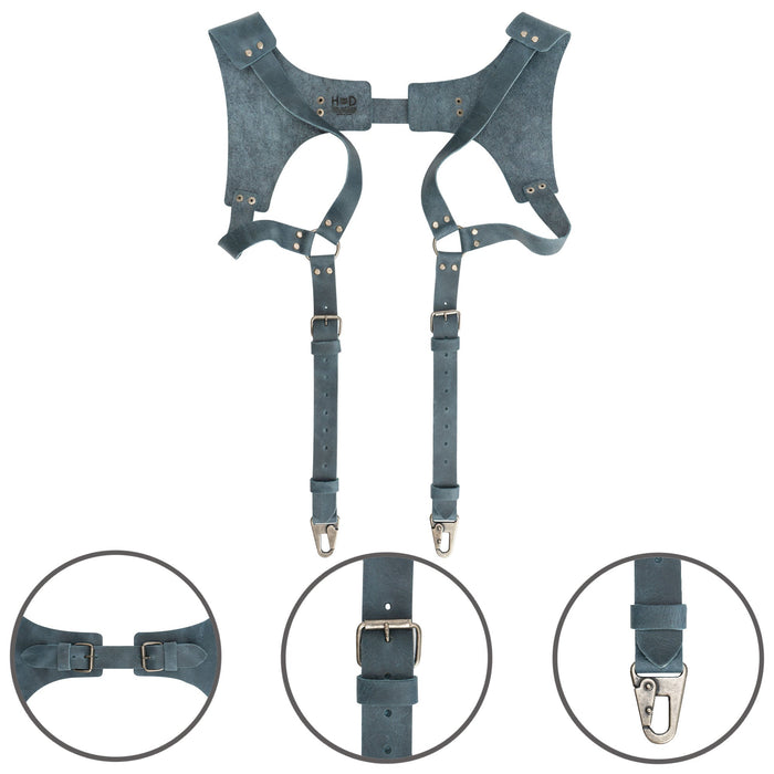 Detail view of dusty blue Renaissance Suspenders by Hide & Drink, emphasizing durable leather construction. This back support harness for men is ideal for groomsmen, showcasing artisan craftsmanship.