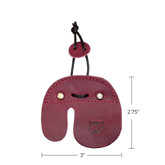 The Right Handed Archery Finger Protector from Hide & Drink displays a stylish full grain leather design. This Archery Finger Tab is a necessary Protect Guard for Recurve Bows, enhancing shooting practice gear for sports and outdoors enthusiasts. Handmade in La Antigua Guatemala, it represents the essence of small batch production with meticulous hand cut and hand sewn craftsmanship, complete with a fire branded artisan finish.