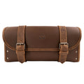Front view of the Riveted Bag for Motorcycle by Hide & Ride showcasing sturdy adjustable belts, large capacity, and detailed craftsmanship in full grain leather. This Motorcycle Riveted Bag is ideal for bikers and features small batch production methods, handcrafted in La Antigua Guatemala & Oaxaca Mexico.
