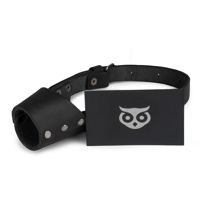Riveted Dog Muzzle by Hide & Drink features a secure design displayed prominently, perfect for preventing biting and chewing in dogs. Made of durable full grain leather, this muzzle guard is great for all breeds, including Pitbulls and German Shepherds, and is handmade in La Antigua Guatemala & Oaxaca Mexico.