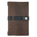 Elegant closure view of Hide & Drink's Riveted Field Note Cover for Moleskine (5 x 8.25 in.) Notebook NOT Included, crafted from premium brown leather. This artisan product showcases quality handmade techniques from La Antigua Guatemala & Oaxaca, Mexico.